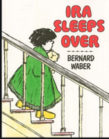 Mrs. Donahue reading Ira Sleeps Over